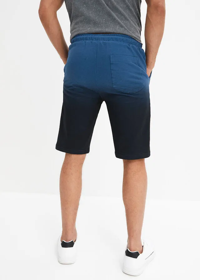 Bermudas de chándal con degradado de color Petróleo azul/negro estampado